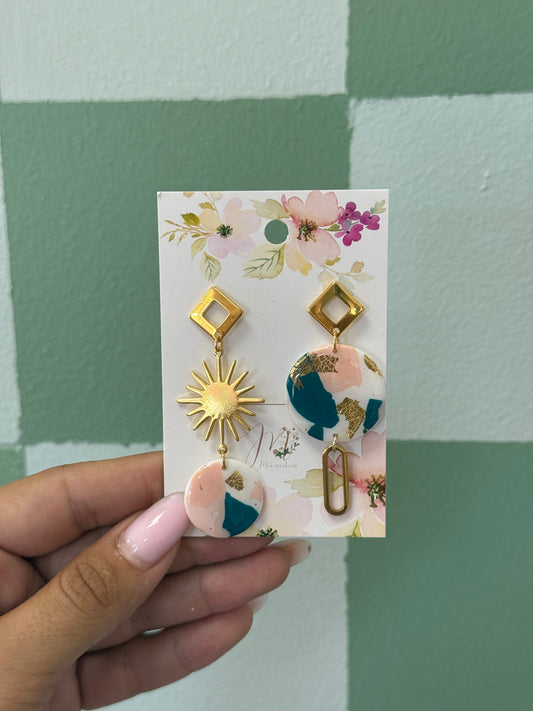 Boucle d’oreille soleil et mixte de couleurs